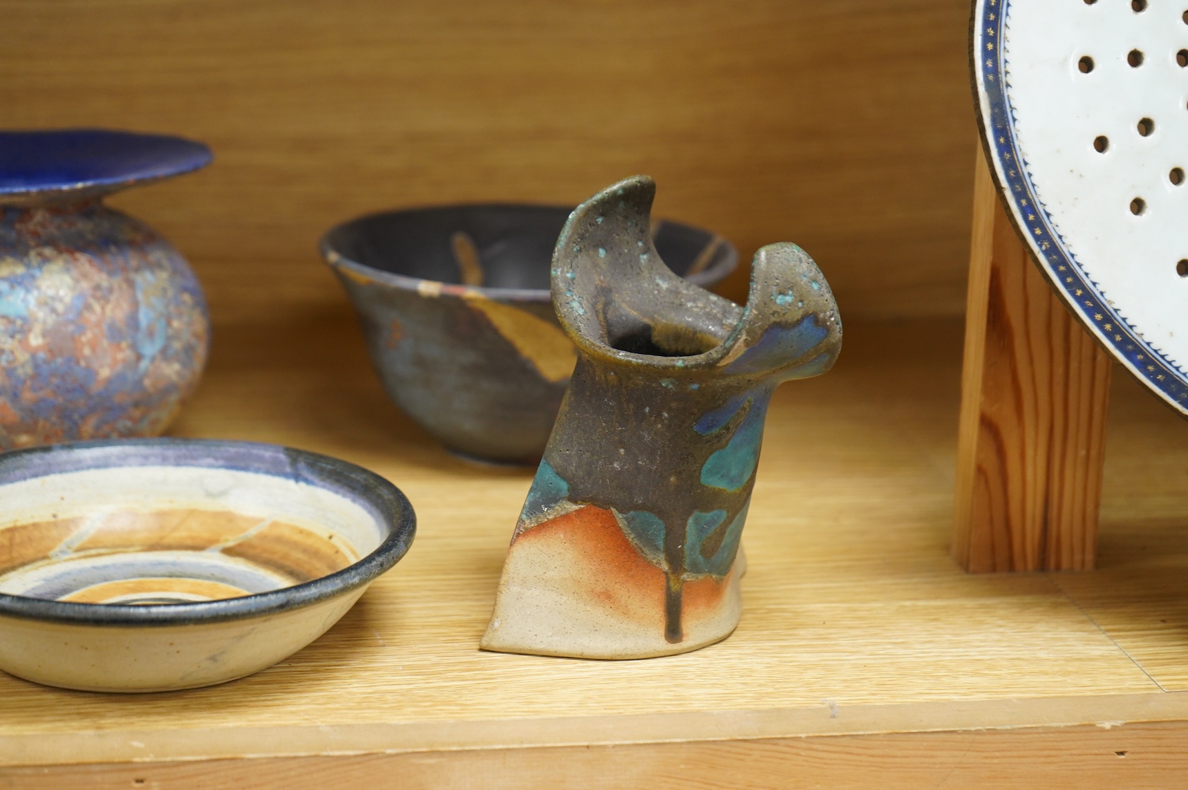 A collection of studio pottery to include crystalline glazed works by Stephen R Jones Des, Brighton, vases and a pair of dishes, largest 22cm high